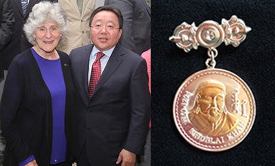Jacbson-Tepfer and Mongolian President Elbegdorj, medal