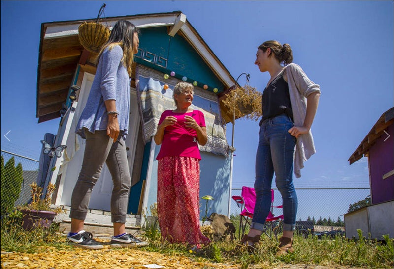 College of Design students Paige Portwood and Samantha Freson meet Alice Gentry (center) at Opportunity Village in Eugene. Photo by Rhianna Gelhart.