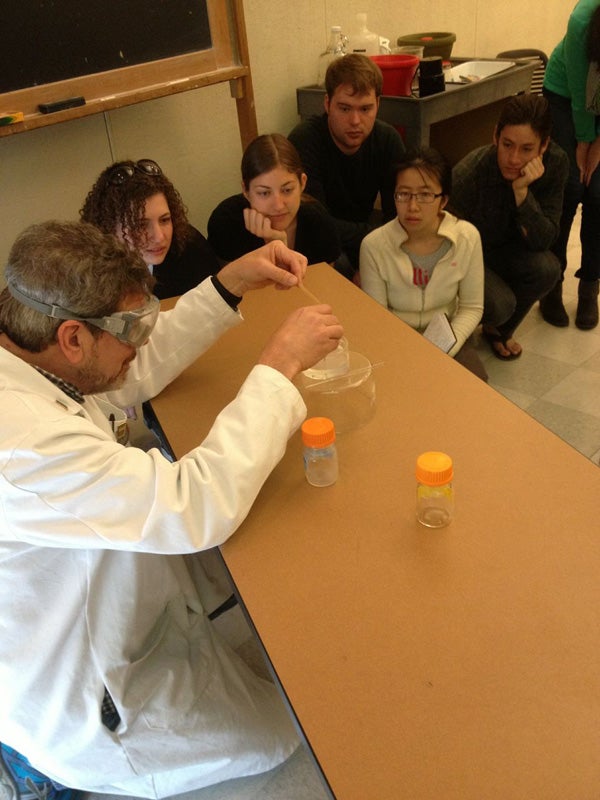 students watching chemistry demonstration