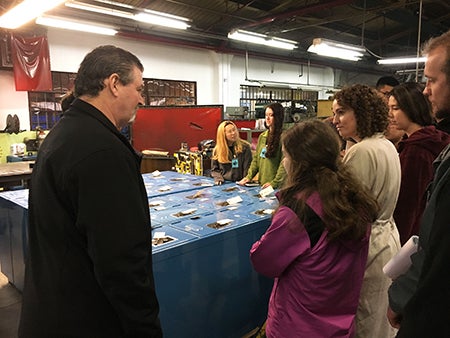 UO product design students visit the Oregon Correctional Enterprises’ furniture factory