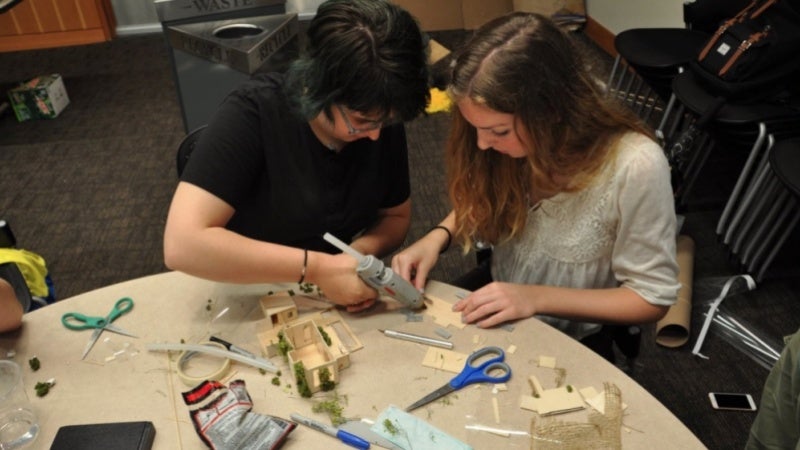 A camper works on a project at the UO Design Camp in Portland