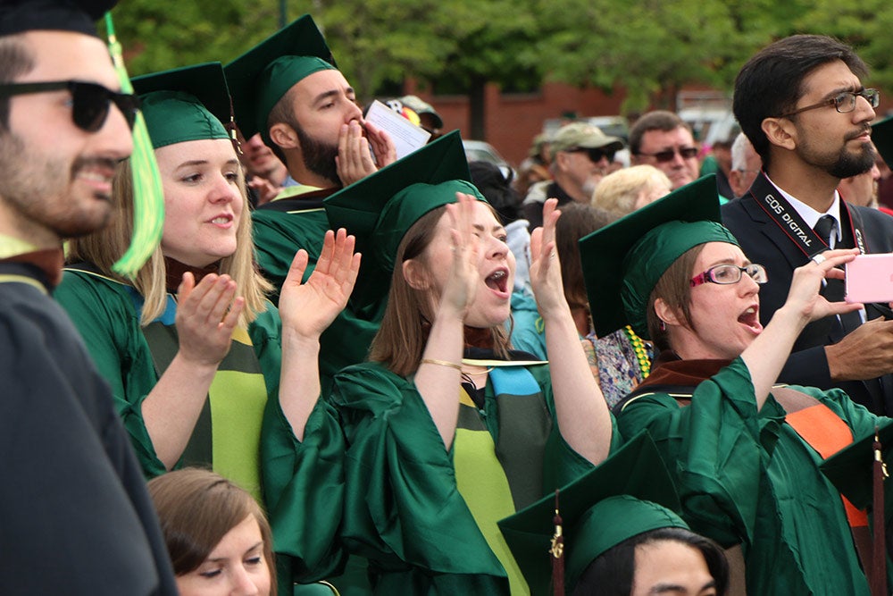 graduates at commencement