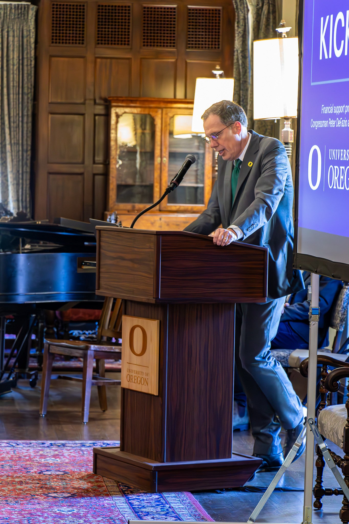 President Scholz addresses the SCYP kick off attendees from a lectern in Gerlinger Hall. 