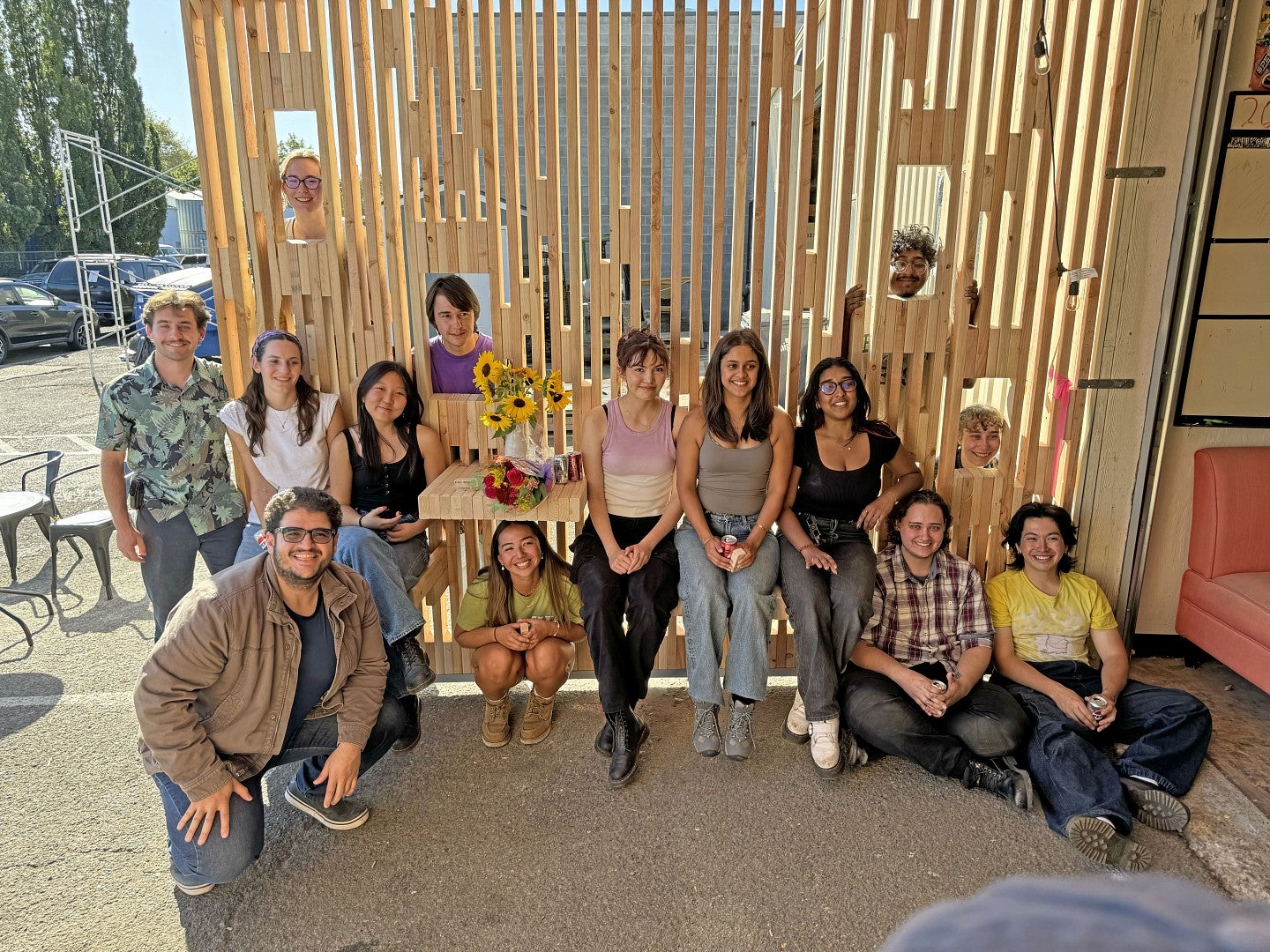 BDI students posing in the finished shelter.