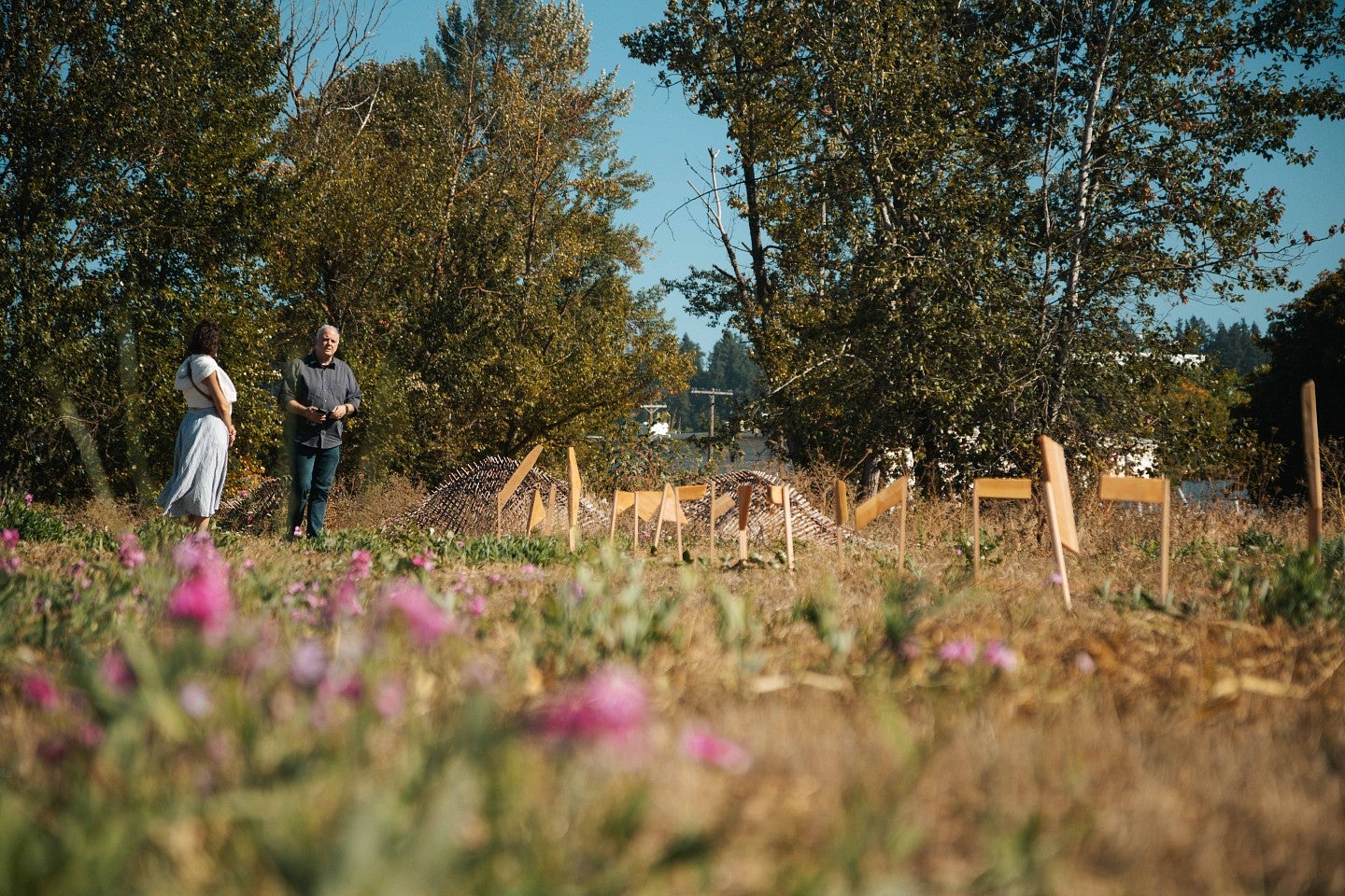 Photograph of the outdoor site with the two workshop leads