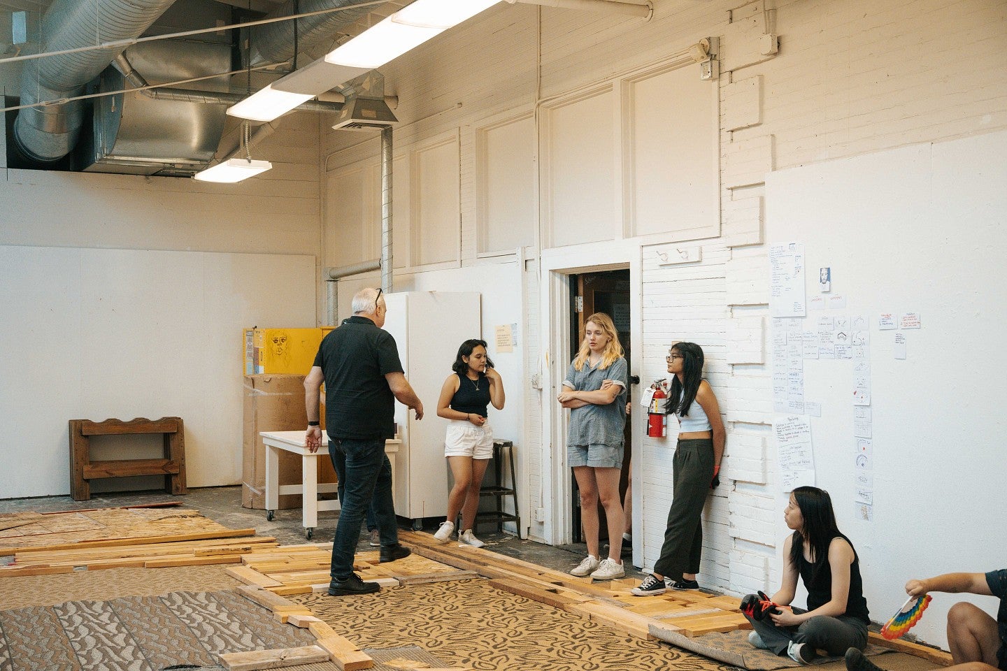 Photograph of the studio working indoors.