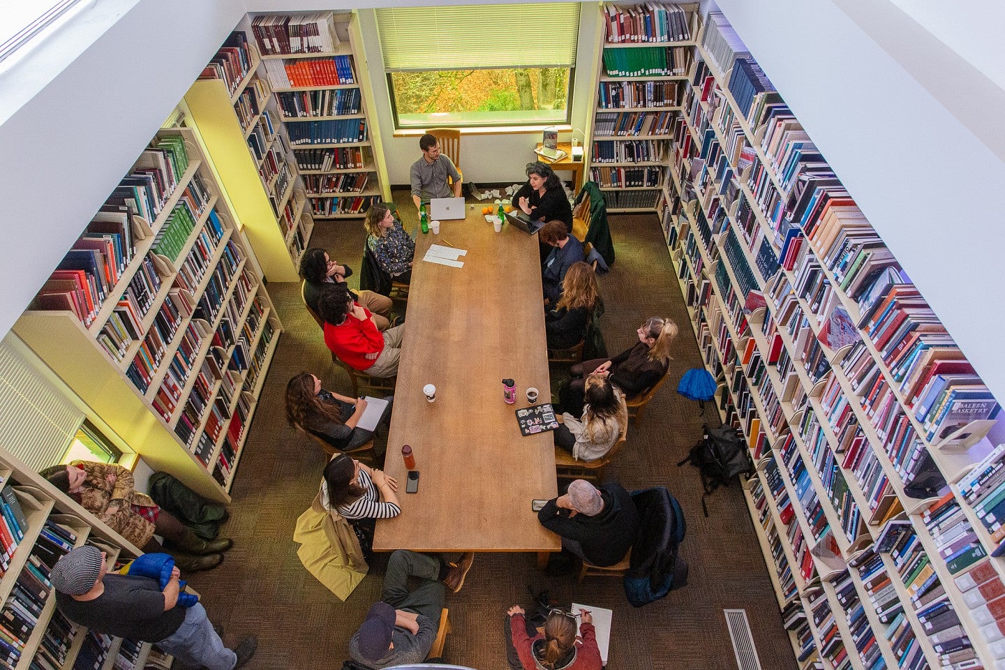 Photograph of students in an art presentation. 