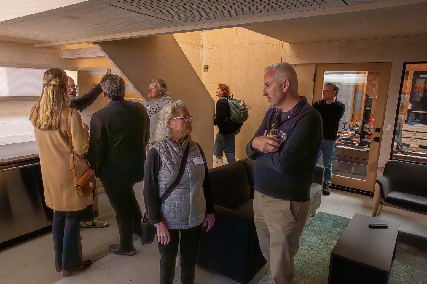 Group of people touring the MPP prototype house. 