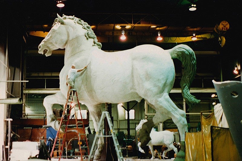 Jay Lindsay on the ladder working on the da Vinci horse.