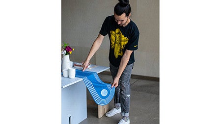 student with table runner