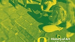 Duotone news header showing students working on the blacktop. Photo is yellow and green. 