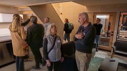 Group of people touring the MPP prototype house. 