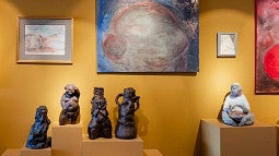 Photograph of the ECC Biennale showcasing both the Dean's paintings and Liu Shiming's sculptures. Click to read more. 