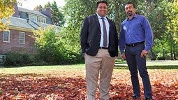 Two men under autumn tree