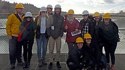 young planning professionals wearing hard hats