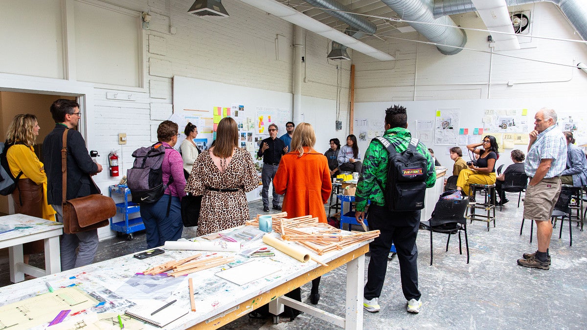 Photograph of a Nike tour group. 