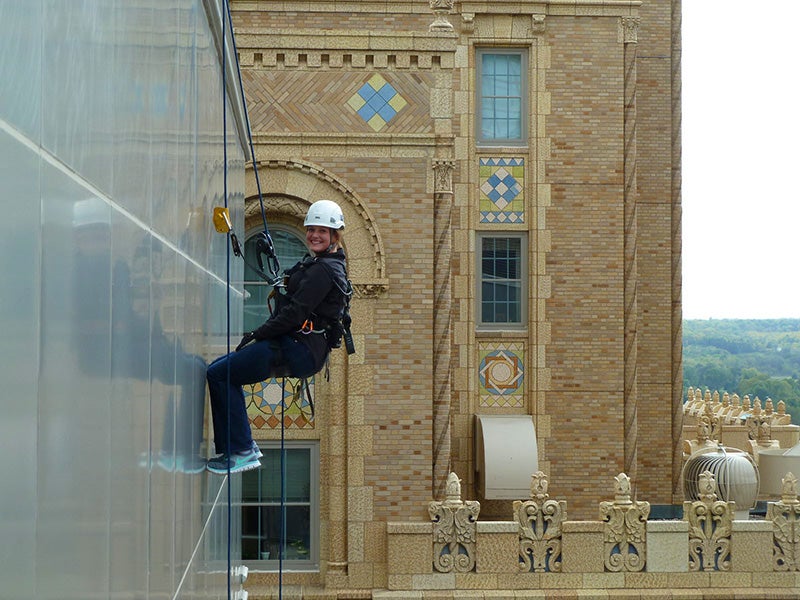 Chelsea Karrels rappels off a Mayo Clinic building