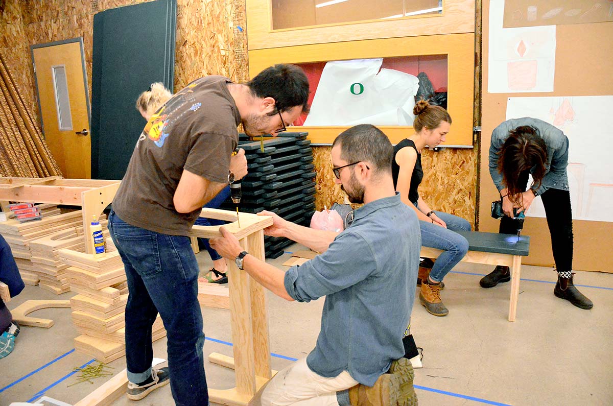 students build furniture for the feast