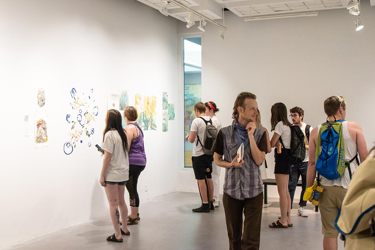 people gather in LaVerne Krause Gallery