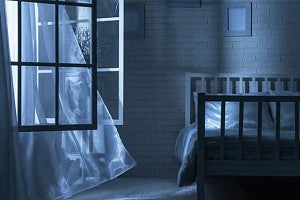 Stock photo of window opening into bedroom