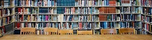 books, chairs and table in library