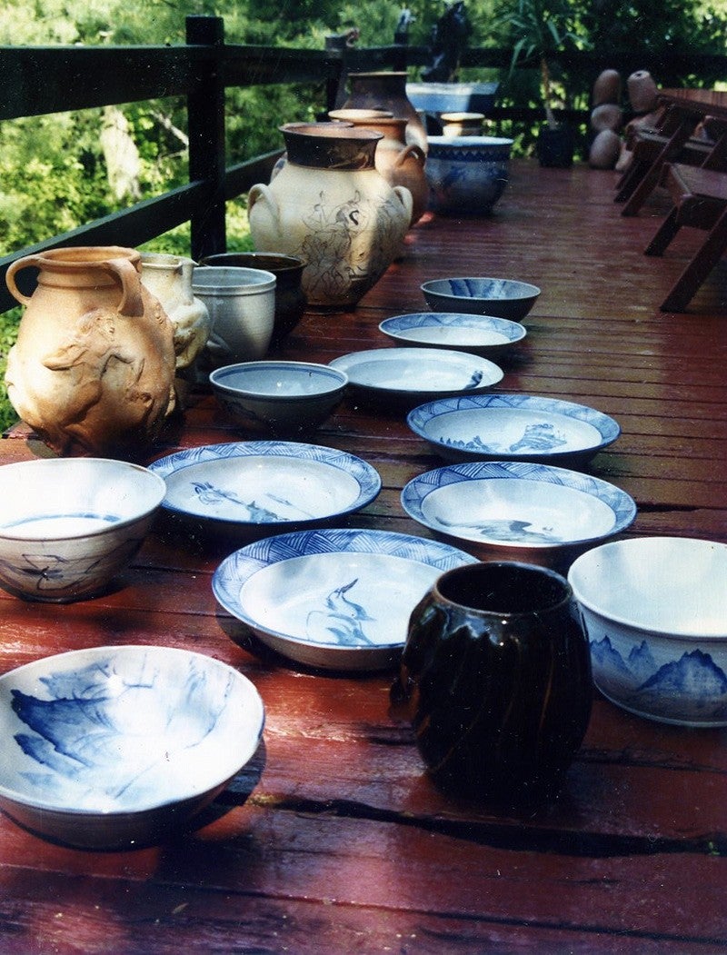 Large glazed pottery sit on Lindsay’s deck outside his house in New York.
