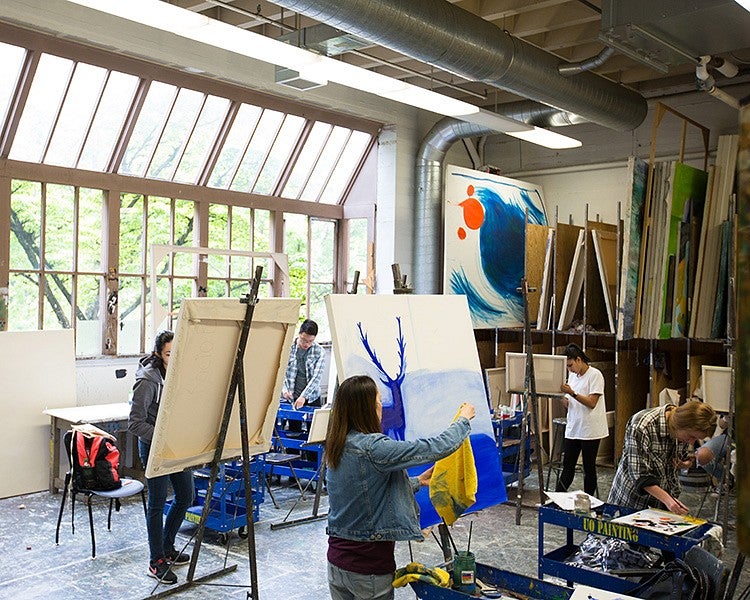 students painting