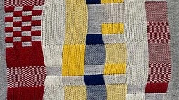 a close-up detail of an art weaving by Jovencio de la Paz