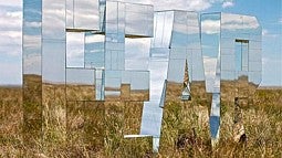 photo of a mirror sculpture in the field