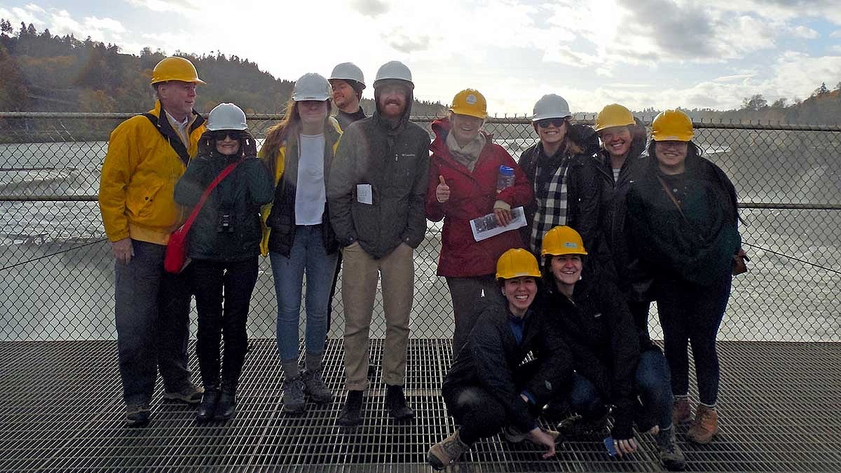 young planning professionals wearing hard hats
