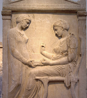 Grave Stele of Hegeso. A tombstone depicting a woman in a chair being given an item by a female slave