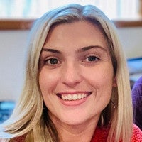 Photograph of Autumn Morgan. Smiling and looking into the camera.